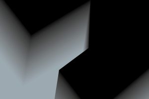 Ein dreidimensionales verwinkeltes Objekt mit geraden Kanten in weißer Farbe vor einem schwarzen Hintergrund.